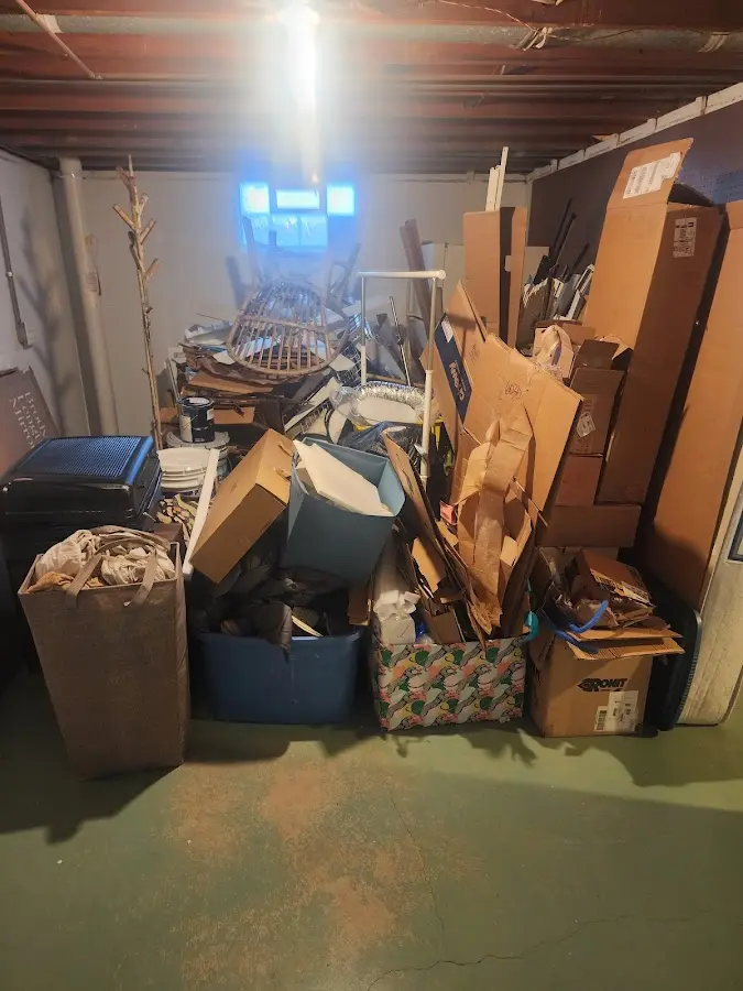 Roll-off dumpster container at job site for 15 Yard Dumpster Rental in Clarksville